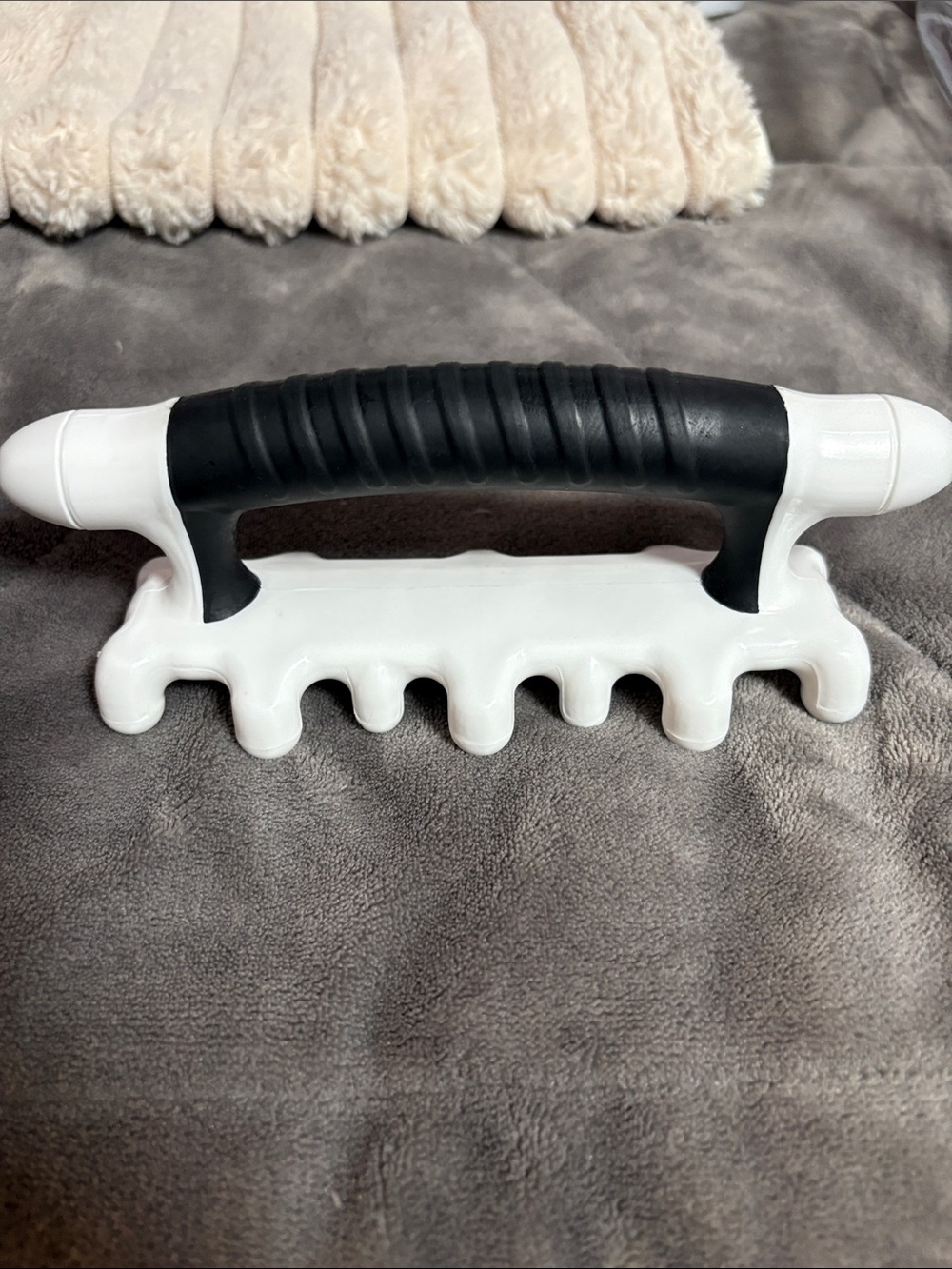 Black and White Handheld Massage Tool by